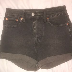 Faded black Levi high rise denim shorts